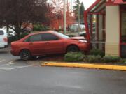 A car crashed into the Arby's restaurant off Mill Plain in East Vancouver on Thursday afternoon.