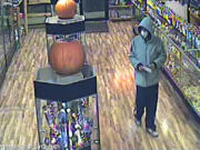 A camera captured this image of the suspect in a Nov. 1 robbery at Mary Jane's House of Glass on Northeast 164th Avenue.