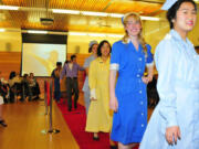 Fircrest: Vancouver-area high school students got gussied up in historical Red Cross uniforms during the Southwest Washington Red Cross Youth Council's annual tea and fashion show in May, including Christiana Lee, front to back, Giselle Kiraly, Waverly He and Allyse Ripley.