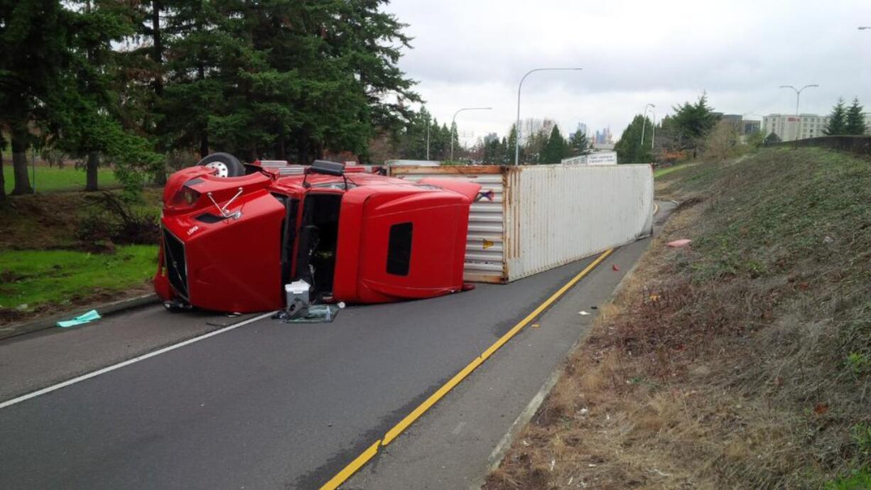 A tractor-trailer carrying solar panels rolled over and blocked the ramp to eastbound state Highway 14. (Trooper D.