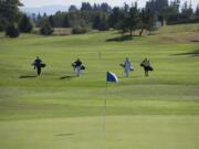 High school golfers play in last week's Jeff Hudson Invitational at Tri-Mountain Golf Course.