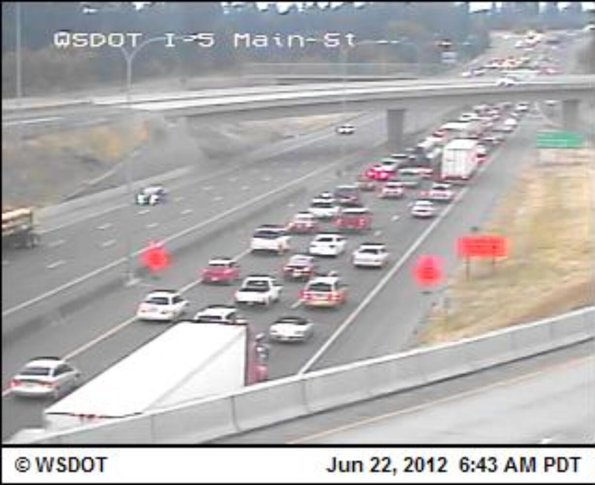 A late opening of the Interstate 5 Bridge caused this traffic backup Friday morning.