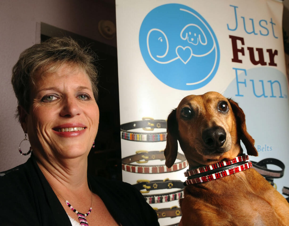 Mona Straub, founder of Just Fur Fun pet accessories, and her dog, Nathan, who is wearing one of her creations.