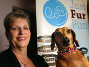 Mona Straub, founder of Just Fur Fun pet accessories, and her dog, Nathan, who is wearing one of her creations.