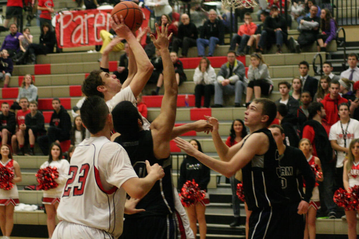 Trevor Jasinsky tries to keep a frantic fourth quarter comeback alive for the Papermaker boys basketball team.