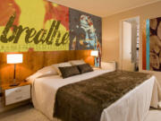 Photos by Charlotte Observer
If you want your bedroom to reflect your interests, a customized mural does the trick.