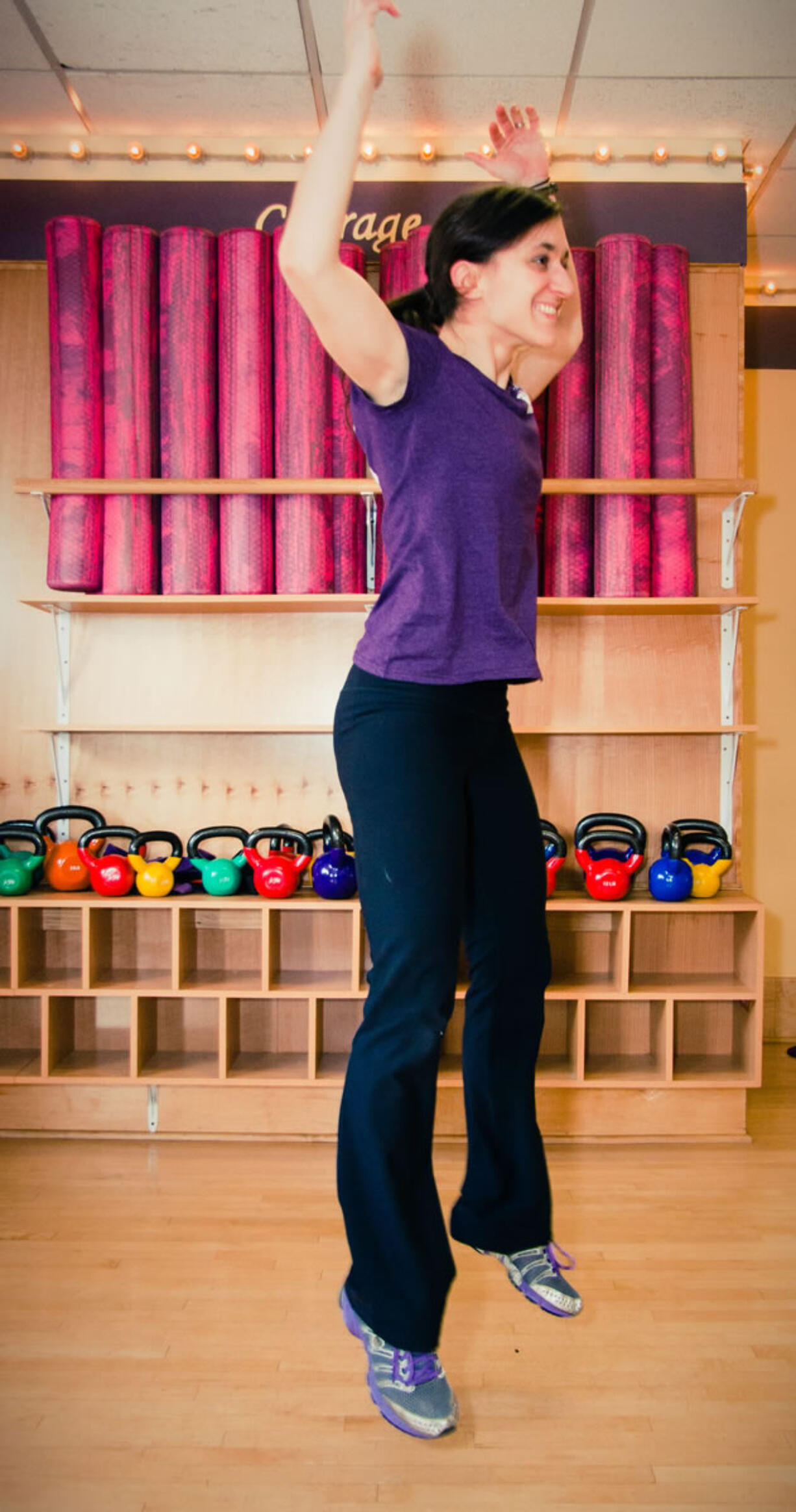 Sara Fletcher performs a jump squat.