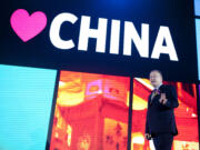 Nelson Ching/Bloomberg News
Nokia CEO Stephen Elop launches the Lumia Windows smartphones in Beijing in March 2012. But Nokia is missing out on the huge Chinese New Year shopping season.