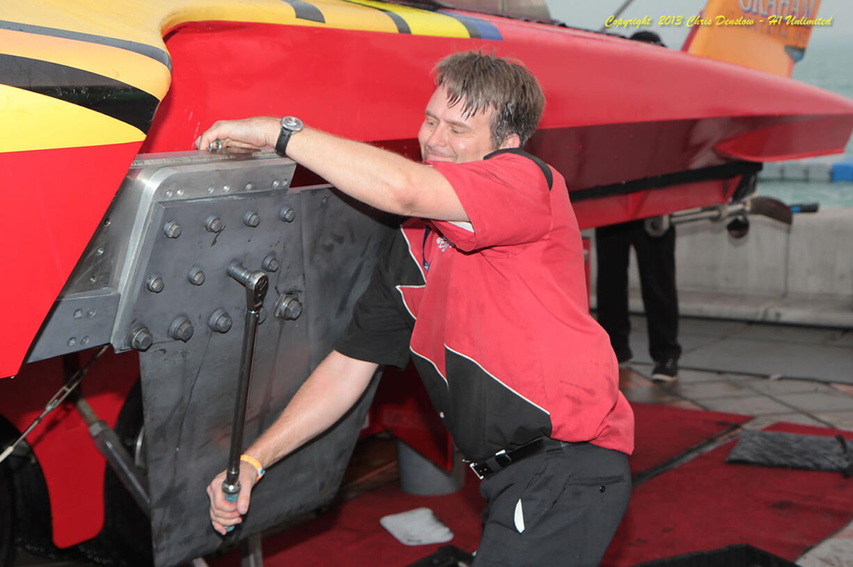 Vancouver resident Nelson Holmberg works on the Graham Trucking hydroplane during the Oryx Cup UIM World Championship in Doha Bay, Qatar.