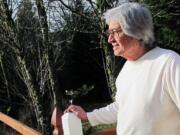 Frank de la Rosa looks out toward the five-acre backyard of the Washougal home he shares with his wife Carolyn. Frank, 79, a former double bass player for singers including Ella Fitzgerald and Sarah Vaughan, retired in 2003. &quot;I play the piano at home just for myself, and I do a lot of reading,&quot; he said. &quot;It's a different generation [of entertainers] now.