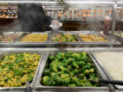 The hot bar's hopping at lunchtime at a Whole Foods Market in Washington.