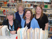 Contributed photo
Washougal elementary school librarians are happiest when surrounded by books.  They are (back row, left to right): Marlene Leifsen and Tammy Asbjornsen, (front row, left to right): Holly Vonderohe and Kathy Stanton.