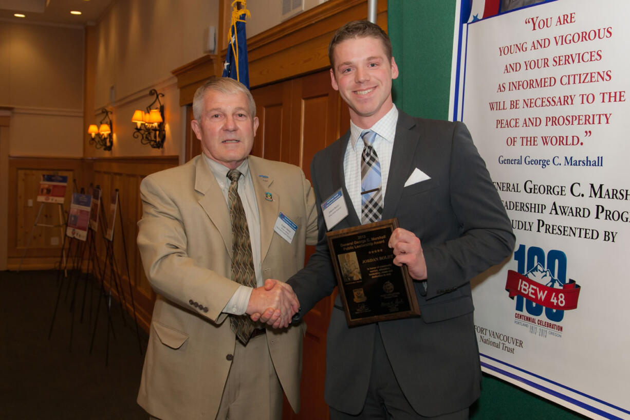 Contributed photo
Vancouver City Councilman Larrry Smith (left) congratulates Jordan Boldt of Washougal, honored as the 2013 Gen. George C. Marshall Public Leadership Award recipient. He is the 24th recipient of this prestigious annual community award honoring the legacy of one-time Vancouver resident Gen. George C. Marshall.