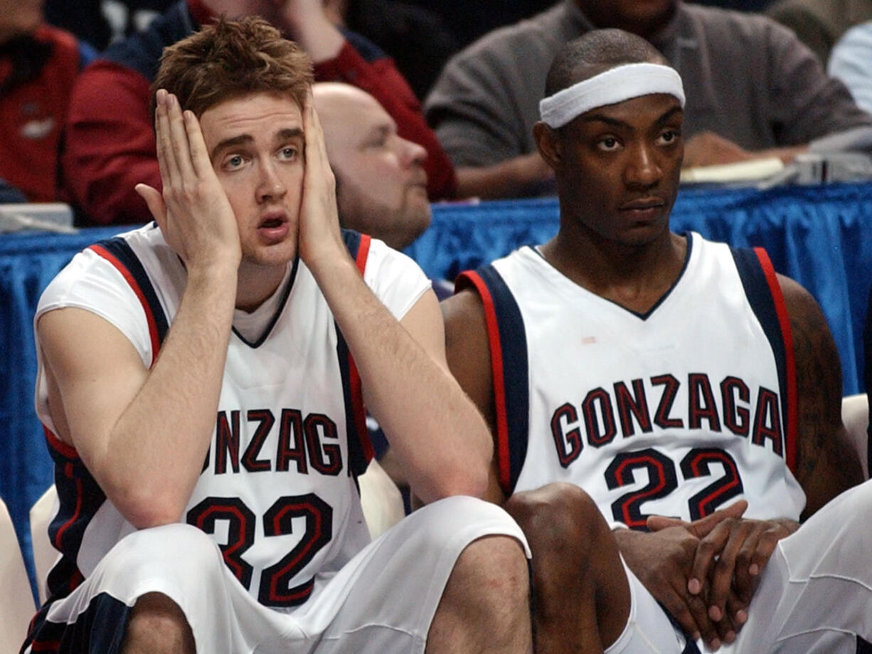 Gonzaga's Sean Mallon (32) and Erroll Knight (22) react late in the second half of the team's 91-72 upset loss to Nevada during the second round of the NCAA tournament in Seattle, Saturday, March 20, 2004.