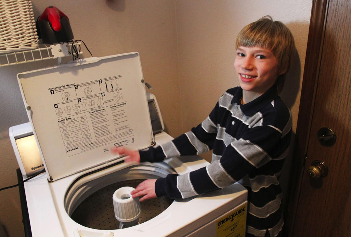 Jonathan Carollo, 11, of Sammamish became a YouTube sensation by banging out a tune titled &quot;Whirled Beat&quot; on the family washing machine.