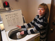 Jonathan Carollo, 11, of Sammamish became a YouTube sensation by banging out a tune titled &quot;Whirled Beat&quot; on the family washing machine.