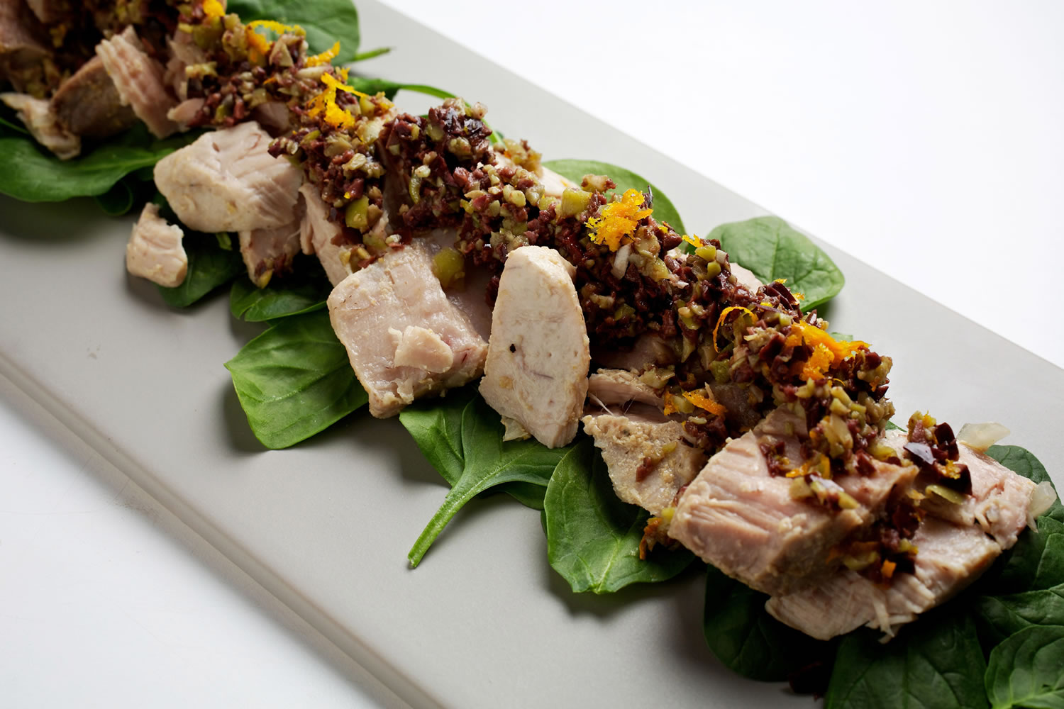 Olive-Oil-Braised Tuna With Orange-Olive Tapenade.