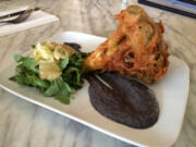 Broccoli tempura with black-bean hummus.