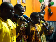 Columbian files
Emmanuel Roberts, left, led his group African Gospel Acappella during a fundraising meal for The Giving Closet, a local charity, on March 1. The other members of the group - all of whom are blind men from war-torn Liberia - are Morris Kermon, Lawson Jallah and Michael Logan.