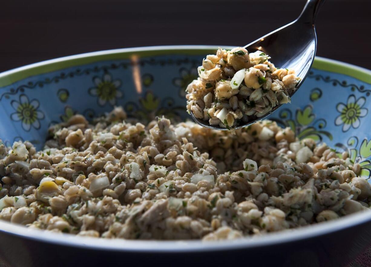 Oil-packed light tuna lends more flavor than tuna packed in water, but you can use either in Lemon-Dressed Farro, Tuna and Chickpea Salad.