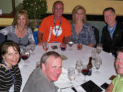 Photo courtesy of Dolly Fisher Bales
Camas and Washougal runners Dana Seekins, Dolly Fisher Bales, Derek O'Quinn and Anita Burkard enjoy dinner with their families before the Boston Marathon. All four runners crossed the finish line before the bombings on April 15.