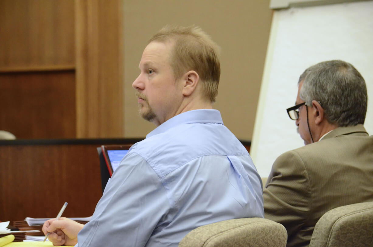 Troy Fisher of Brush Prairie listens to proceedings during his April trial in Clark County Superior Court Judge Barbara Johnson's courtroom.