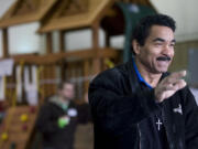 Costco Wholesale employee Teddy Patrick greets customers at the front door in 2010. Thousands of Costco customers call themselves fans on a Facebook page devoted to Patrick.