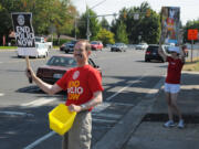 Local architect Randy Salisbury goes &quot;Panhandling for Polio&quot; as part of an effort by seven Clark County Rotary Clubs to help eradicate the disease in September 2011.