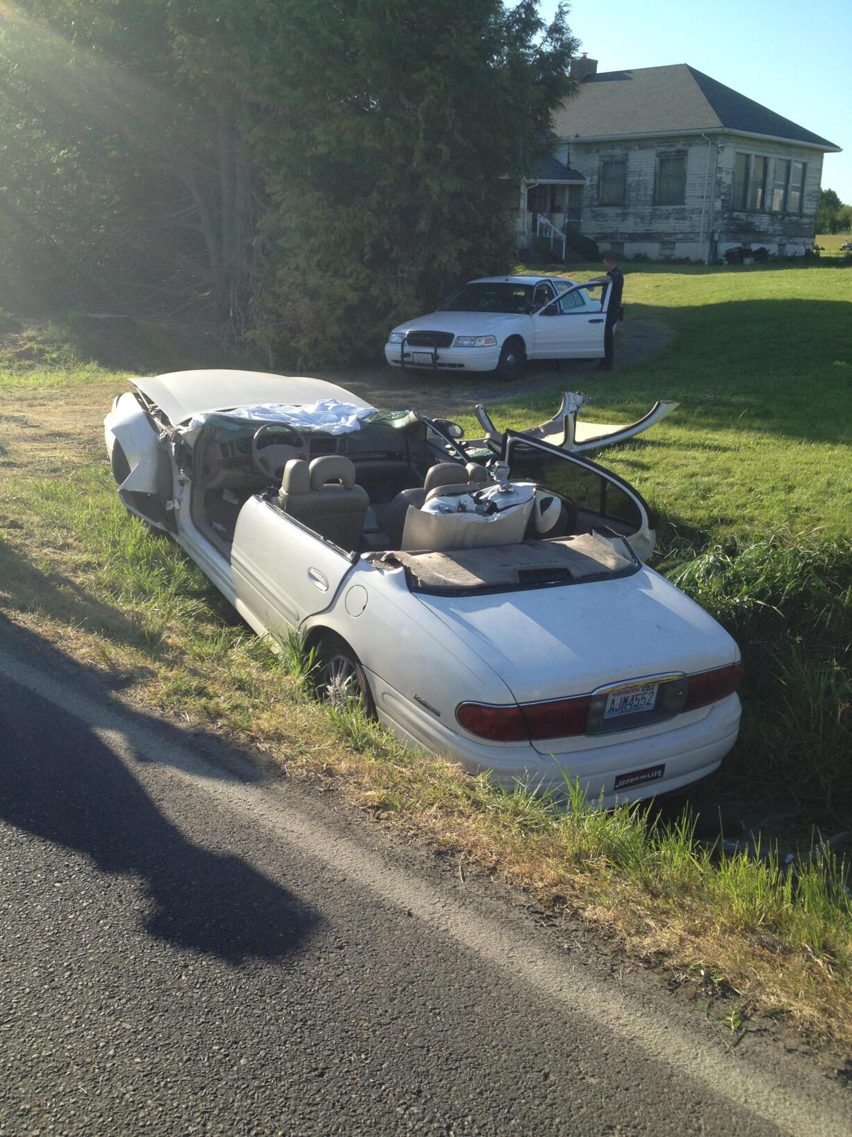 A woman who was apparently blinded by the sun as she drove westbound on Northeast 259th Street in Ridgefield, veered off the road and crashed into a ditch, stopping just before a driveway.