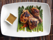 Fresh lemons, olive oil and Dijon mustard are paired with chicken, asparagus and sweet mini bell peppers in this dish.