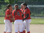 Camas softball players Amee Aarhus, Lena Richards, Katie Schroeder, Harli Hubbard and Caylin Grindy are excited to be going back to the state championship tournament Friday and Saturday, in Spokane.