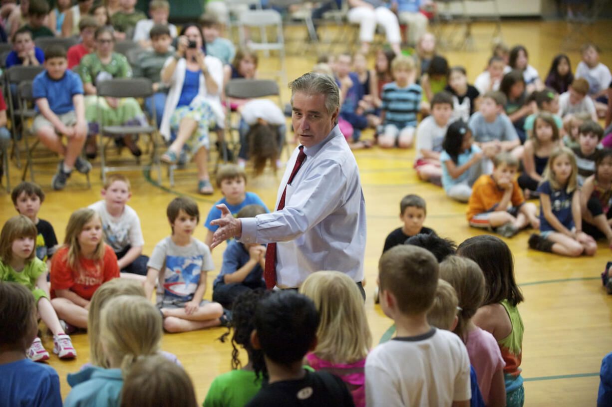 Lou Brancaccio, editor of The Columbian, speaks to students at Hough Elementary School about the importance of being honest.