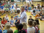 Lou Brancaccio, editor of The Columbian, speaks to students at Hough Elementary School about the importance of being honest.