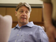 Dennis Wolter, accused of killing his estranged  girlfriend and dumping her body along Old Evergreen Highway, turns during a recess of his trial in Judge Robert Lewis' courtroom, Wednesday, May 29, 2013.