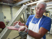 Self-taught tea expert David DeCandia, 53, who drinks three gallons of tea a day, explains how his company, Coffee Bean &amp; Tea Leaf, makes a variety of brews at the firm's processing facility in Camarillo, Calif.