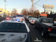 Vancouver Police check out a possible abandoned vehicle on Harney Street in December 2011.