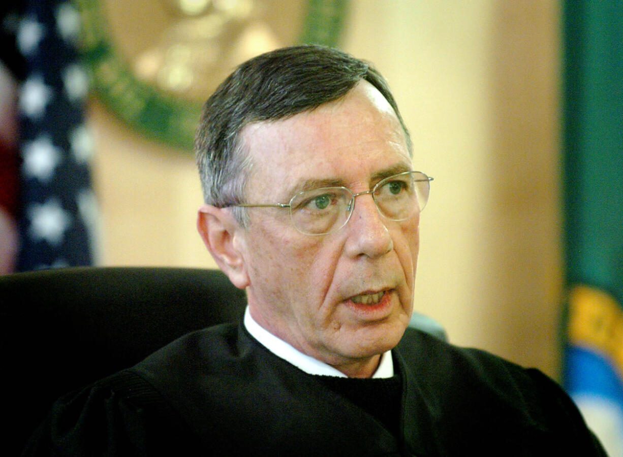 Judge John Wulle chastises convicted murderer Roy Russell after Russell gave his last statement during the sentencing phase of Russell's murder trail.