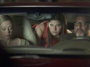 Roadside Attractions
Lake Bell, middle, plays a voice coach motivated by her father (Fred Melamed) in &quot;In a World ...,&quot; which mixes drama and levity that could spell a summer movie sleeper hit.