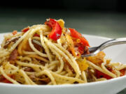 There are many creative ways to serve the seasonal bounty of vegetables through such dishes as spaghetti with wilted peppers.