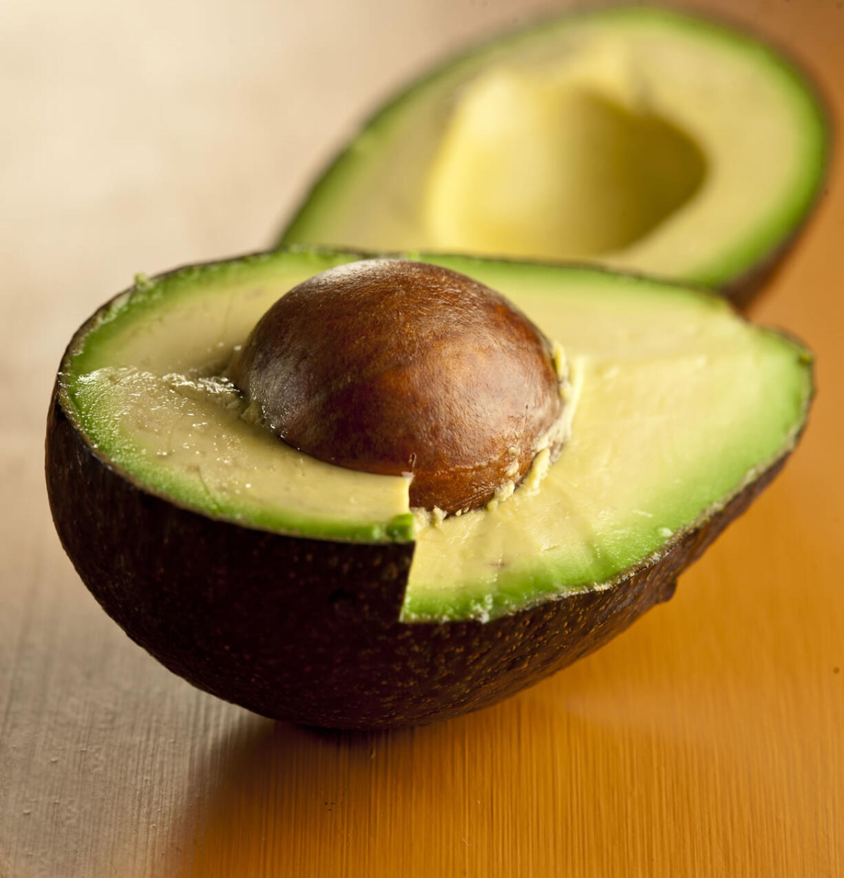 The perfect avocado should have unblemished skin, and when squeezed, have a soft give to the flesh.