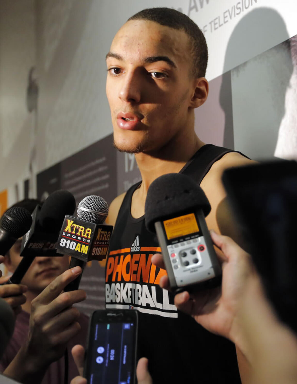 NBA draft prospect Rudy Gobert, of France, speaks with the media after a workout with the Phoenix Suns on June 5.