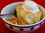 A cobbler is a dessert consisting of sugared fruit topped with a sweetened biscuit topping.