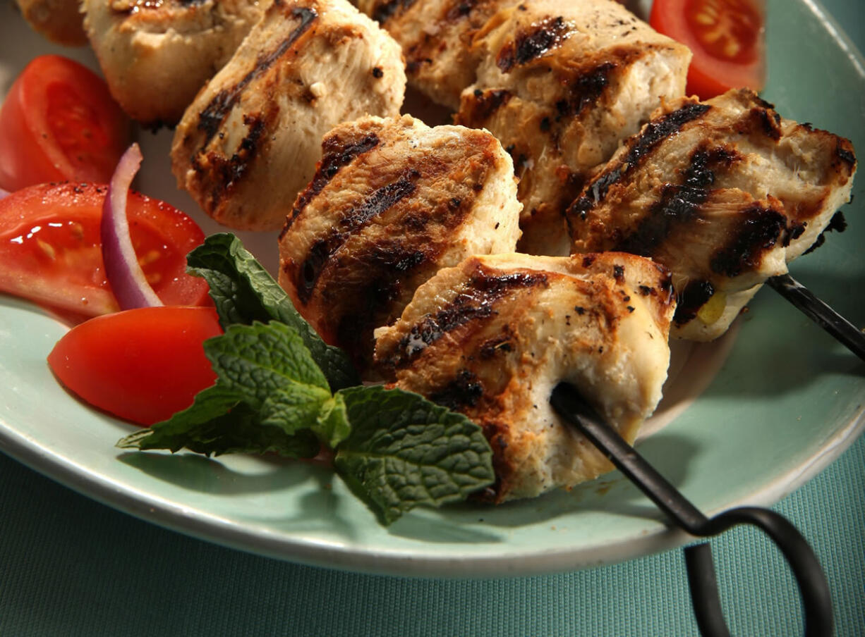 Skewered Chicken (Murgh Tikka) adapted from &quot;The Yogurt Cookbook&quot; by Arto Der Haroutunian (Interlink Books, $35) can be served with a tomato and onion salad.