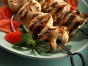 Skewered Chicken (Murgh Tikka) adapted from &quot;The Yogurt Cookbook&quot; by Arto Der Haroutunian (Interlink Books, $35) can be served with a tomato and onion salad.