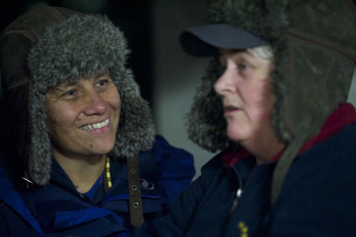 Shawn Sanders, right, and Jocelyn Guzman wait in line Dec. 6 to become one of Clark County's first same-sex couples to marry. Wednesday's U.S.