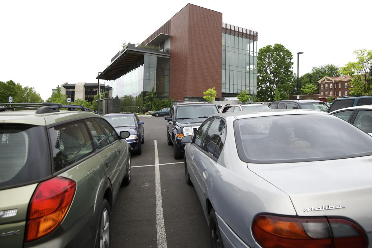 A small parking lot is filled to capacity May 8 at the Vancouver Community Library.