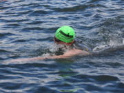 Washougal's Nathan Milojevic swims through Lake Coeur d'Alene to begin the Ironman Coeur d'Alene June 23.