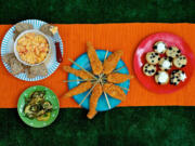 From left, Lightened-Up Pimento Cheese, Roasted Green Bean and Potato Salad, Oven-Fried Chicken on a Stick, and Individual Fruit Cobblers.