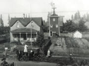 Felida: This photograph of Erickson Farms was taken in 1905, just a few years after the place was established. Standing on the walk near the center of the frame is Ruth Anderson, mother of Vinton Erickson.