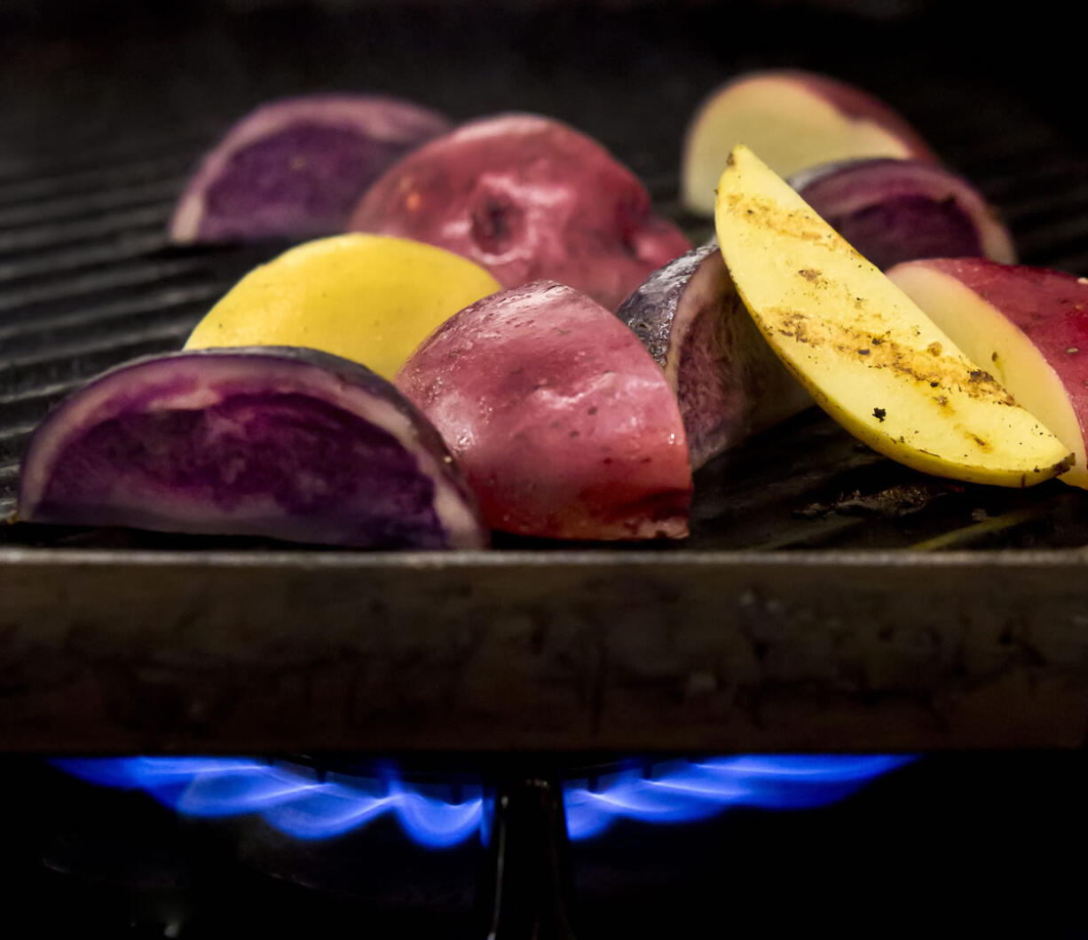 For a wonderful smoky flavor, put potato halves in a microwave-safe bowl; microwave, covered, until just tender. Cool slightly; coat lightly with olive oil.